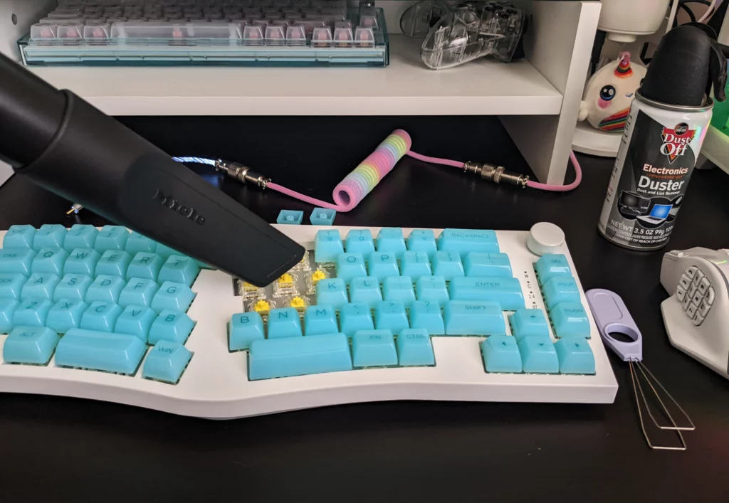 Clean your PC setup - keyboard - Use a vacuum to remove dust